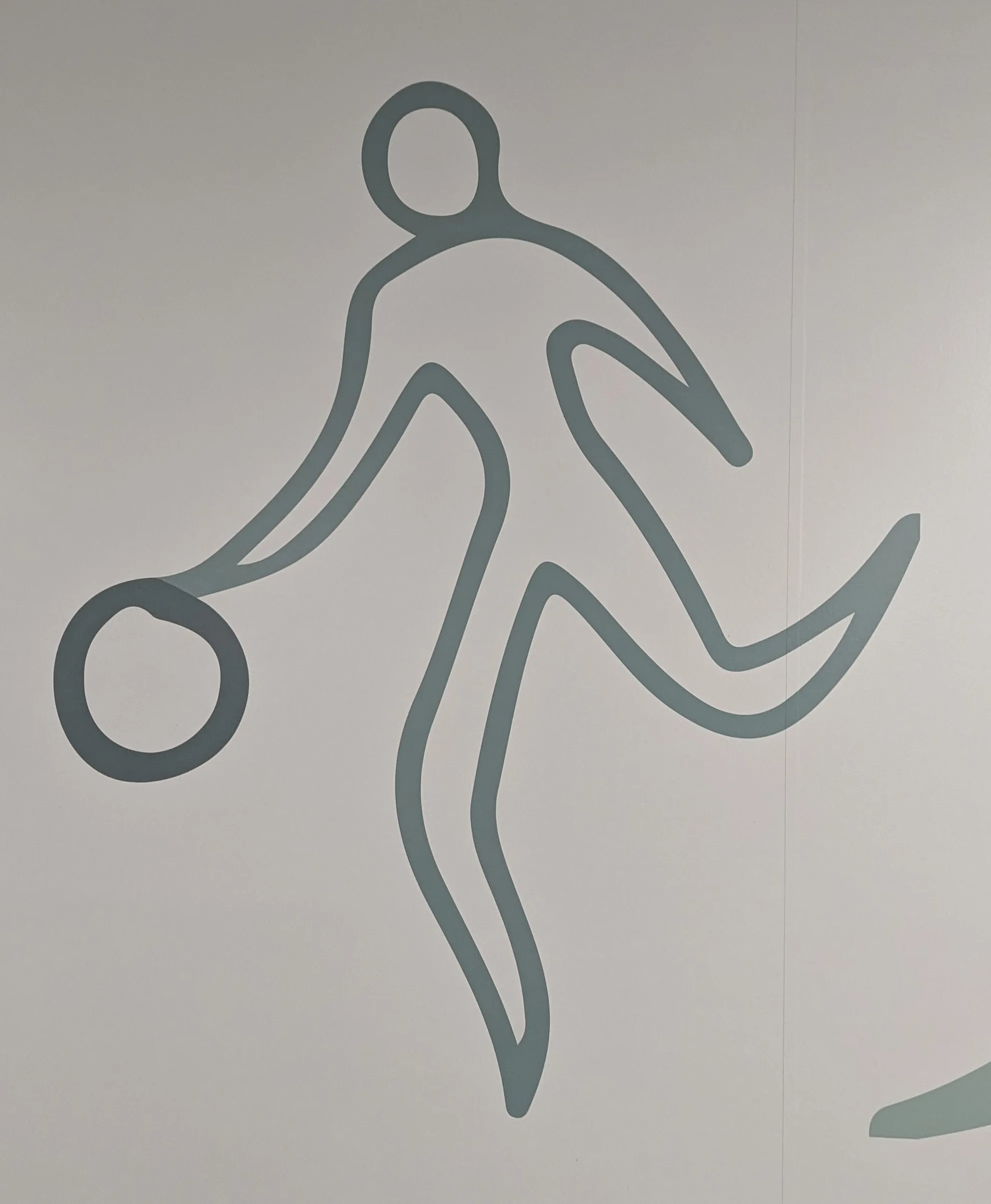 Someone dribbling a basketball